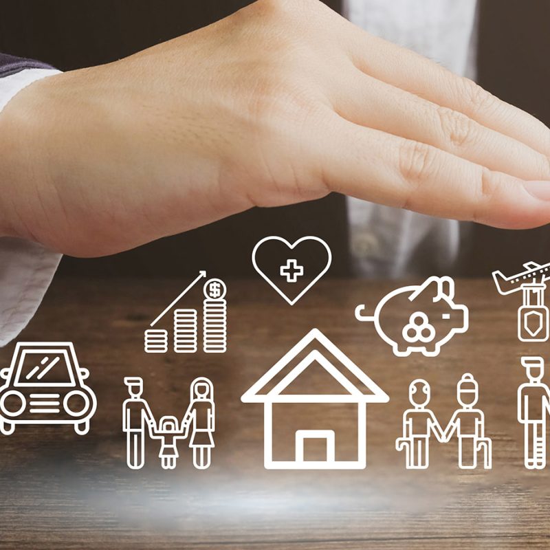 Businessman protecting car , house , life ,healthcare , family , travel insurance icon.